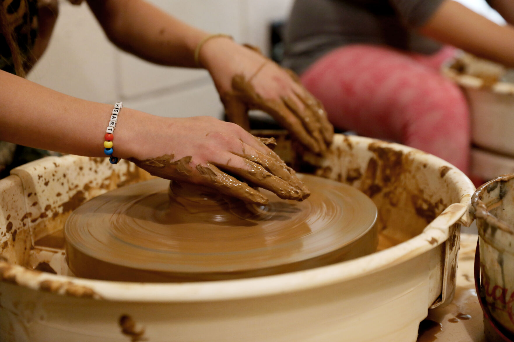 Students work on clay